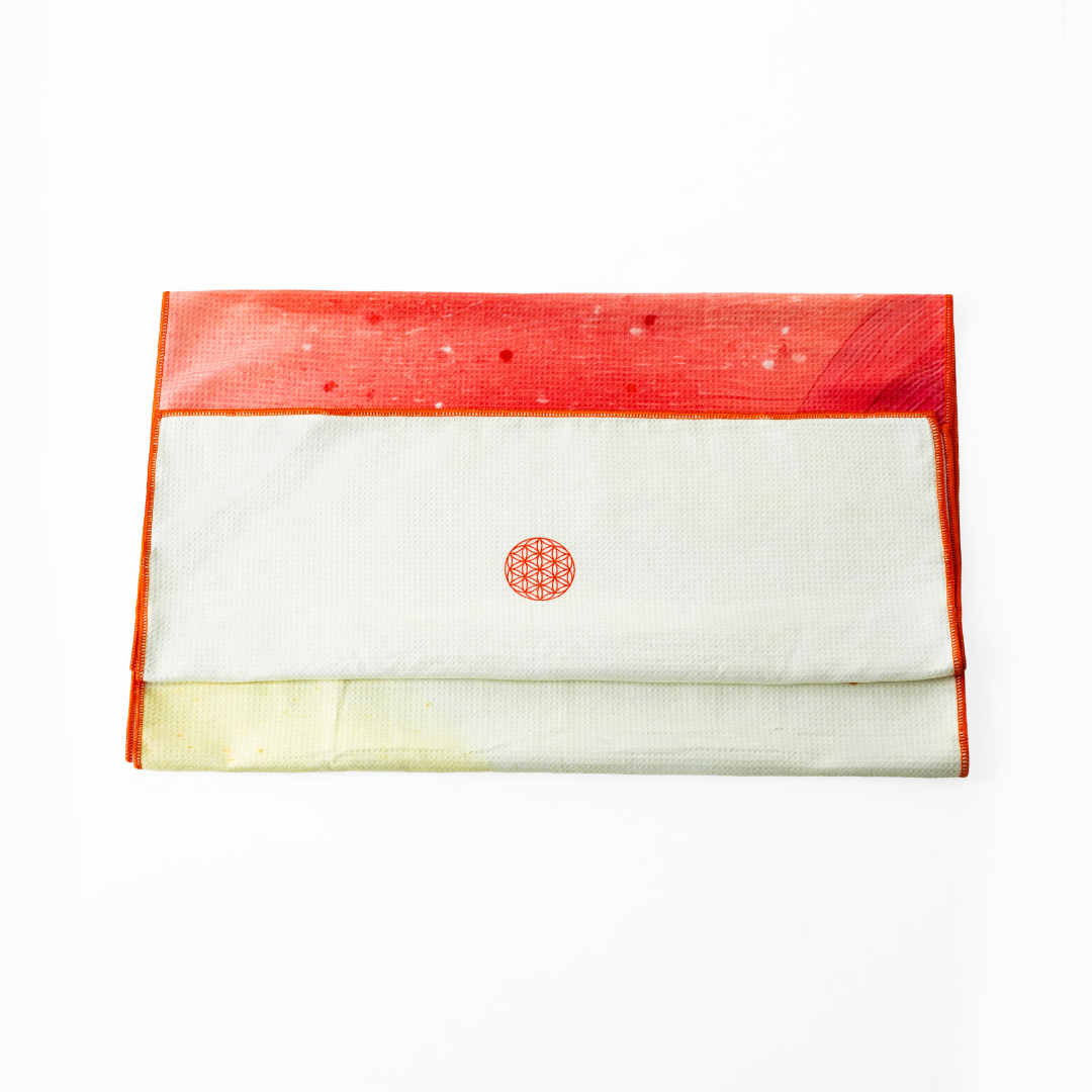 folded orange yoga towel#color_solar blaze
