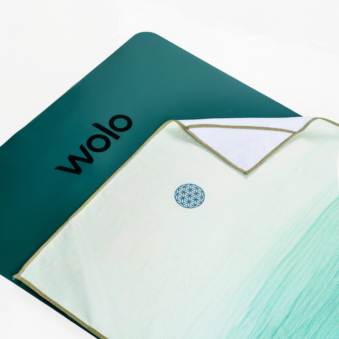 Green yoga towel on a green yoga mat#color_verdant flow