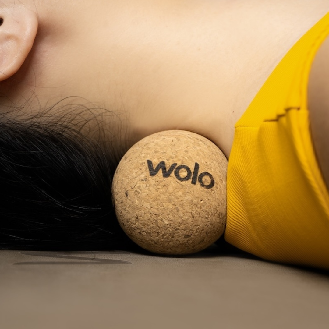 Release neck tension using a cork massage ball