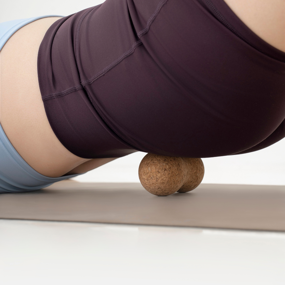 Hip release using a cork peanut massage ball
