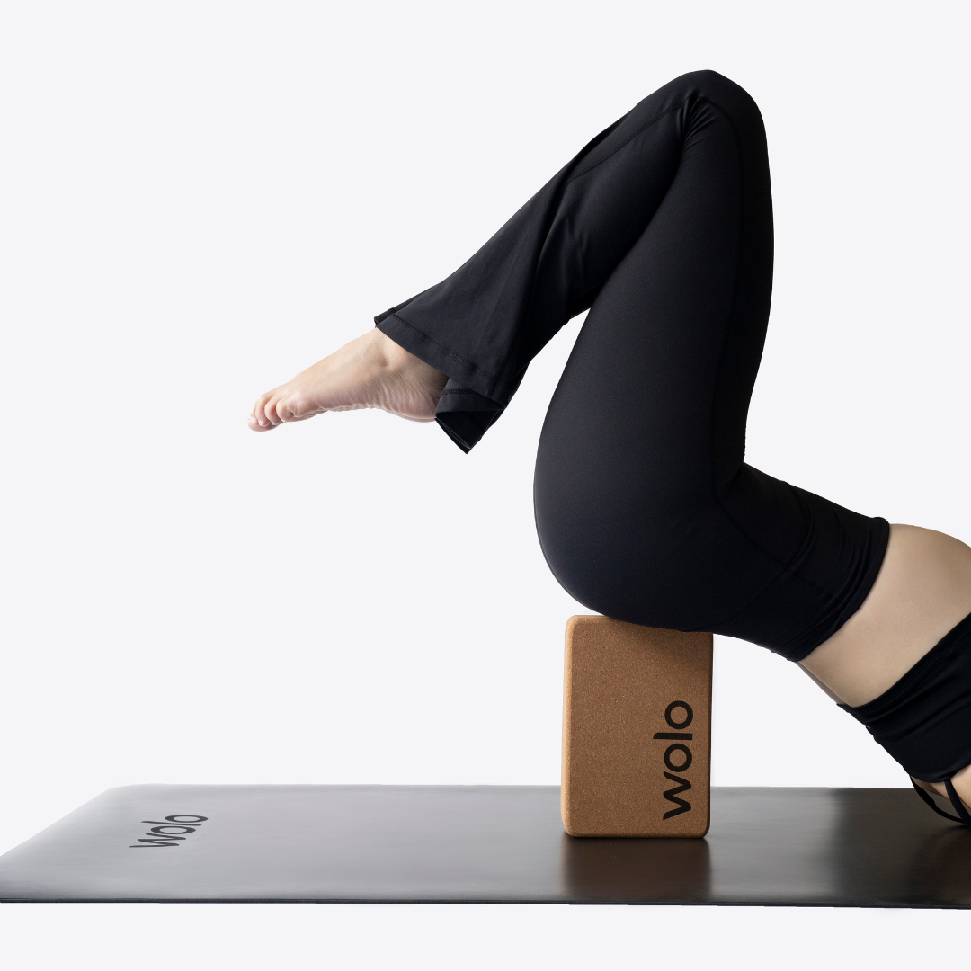 Height support using a cork yoga block