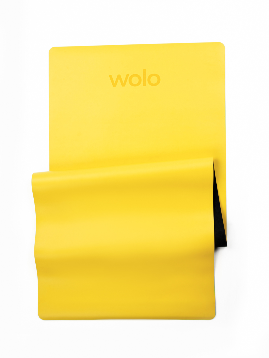Close-up view of a Saffron yellow yoga mat