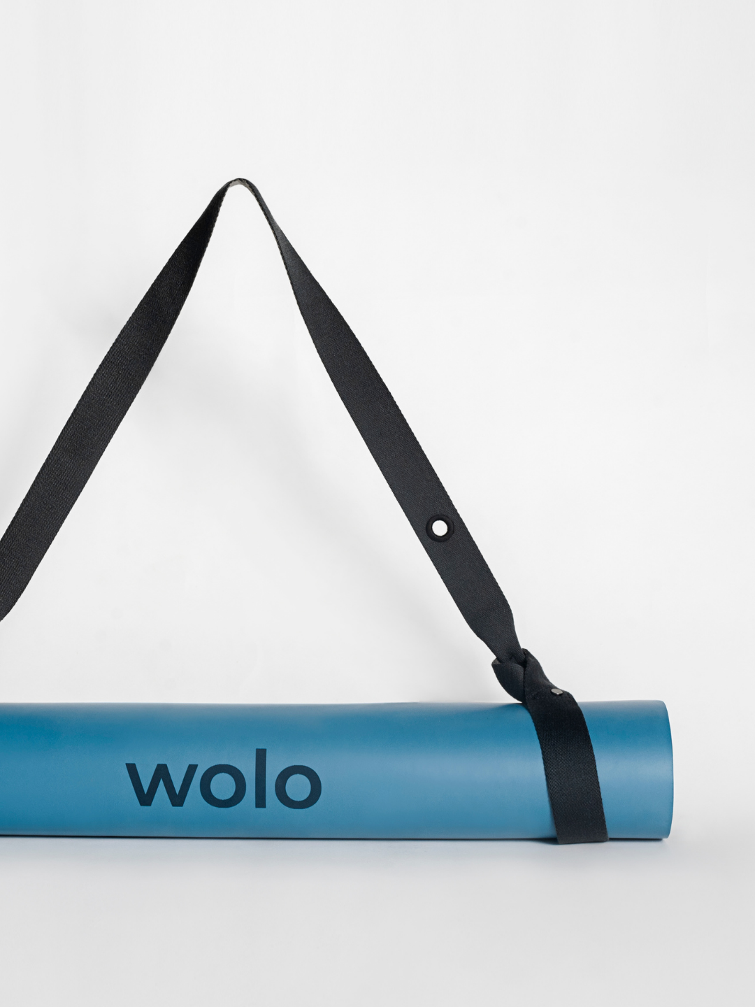 Yoga mat with an Ash grey On The Go yoga mat strap