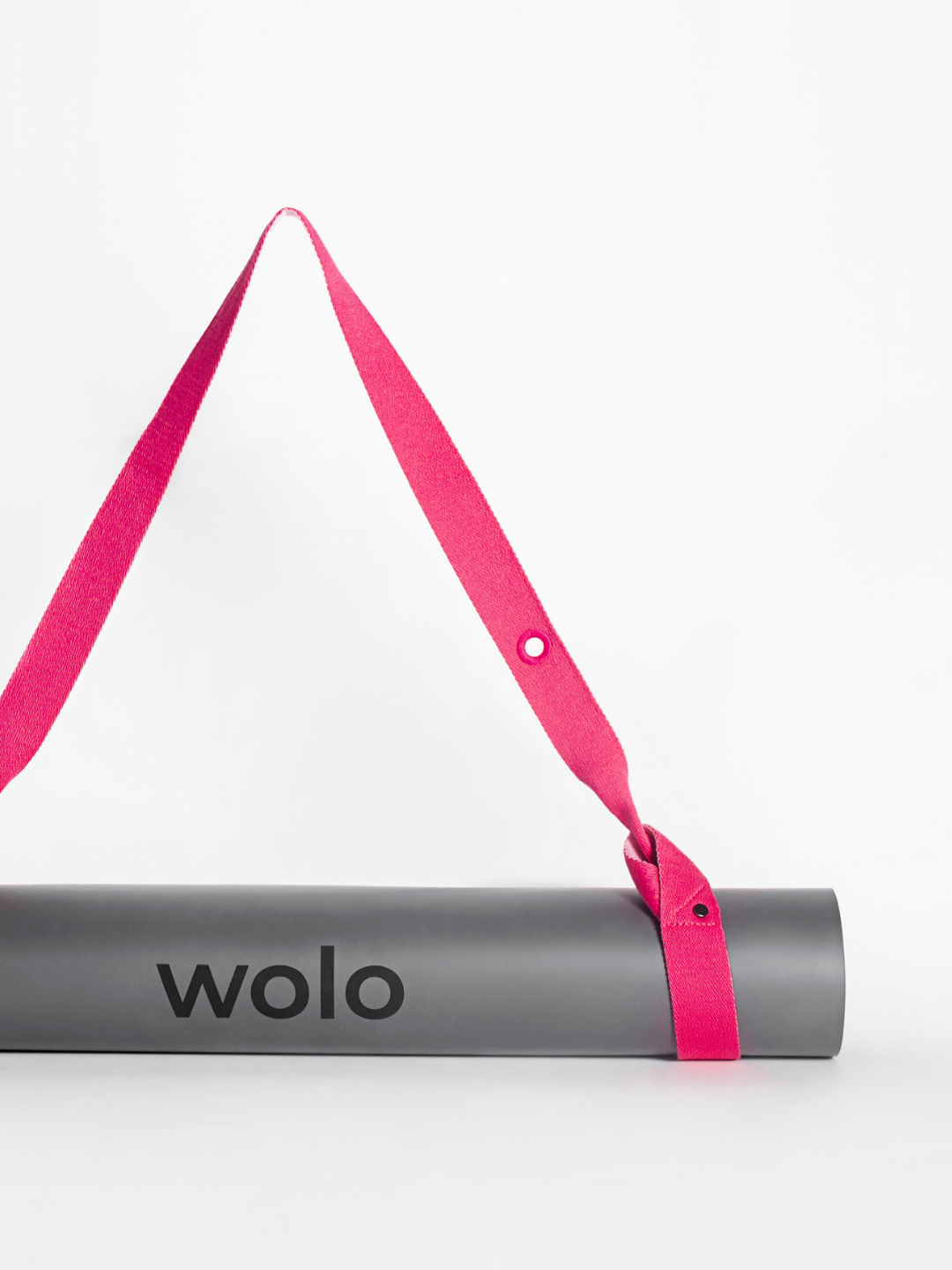 Yoga mat with a Lemonade pink On The Go yoga mat strap