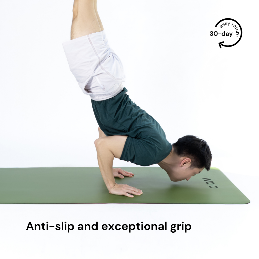 handstand on the sage green yoga mat