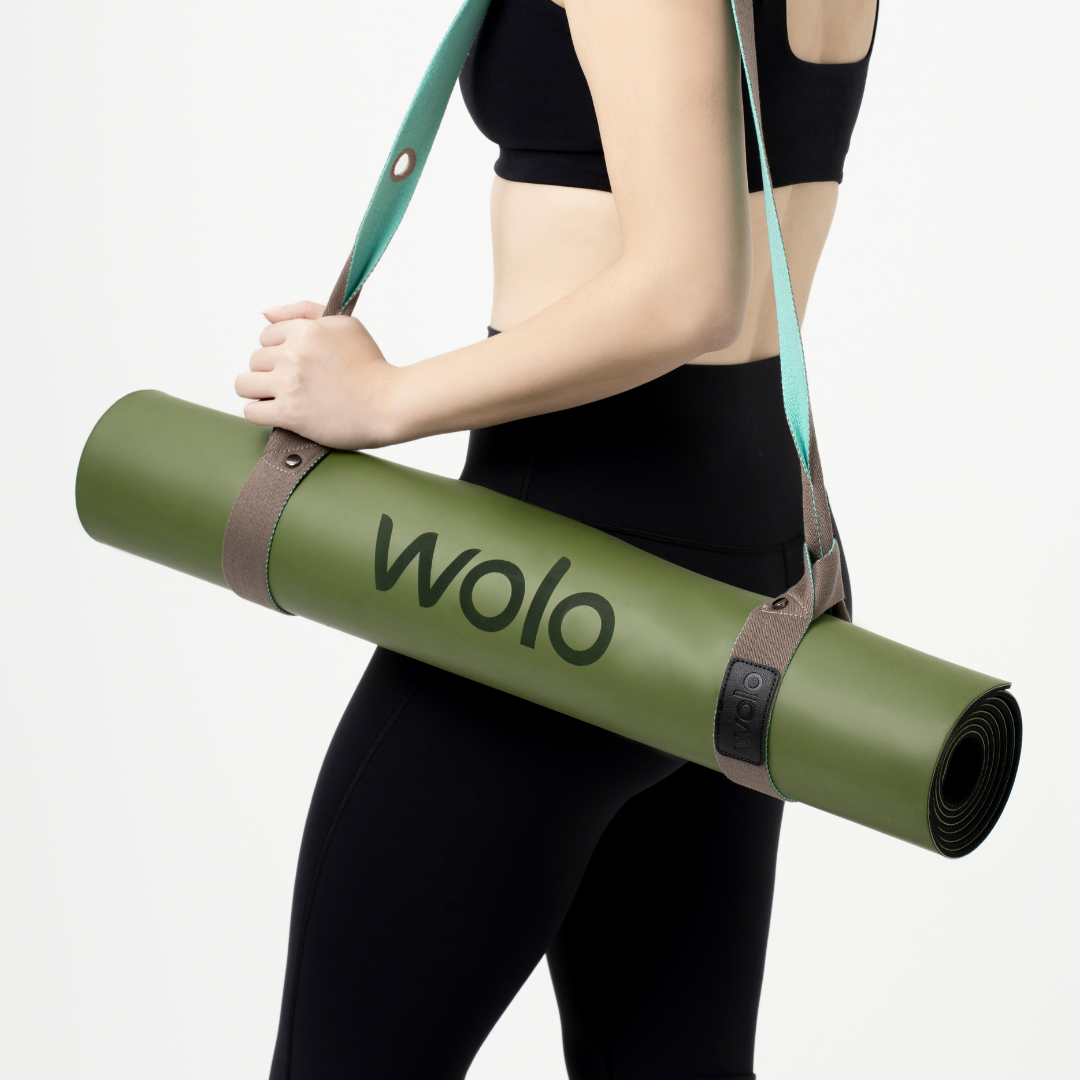 lady carry green yoga mat with mint green yoga mat strap