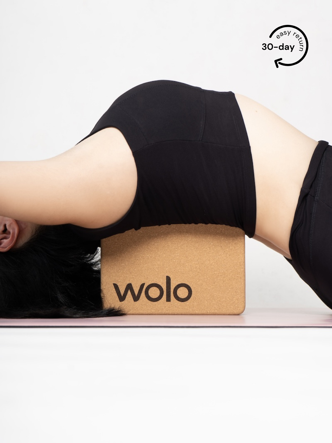 Open up the back with a cork yoga block