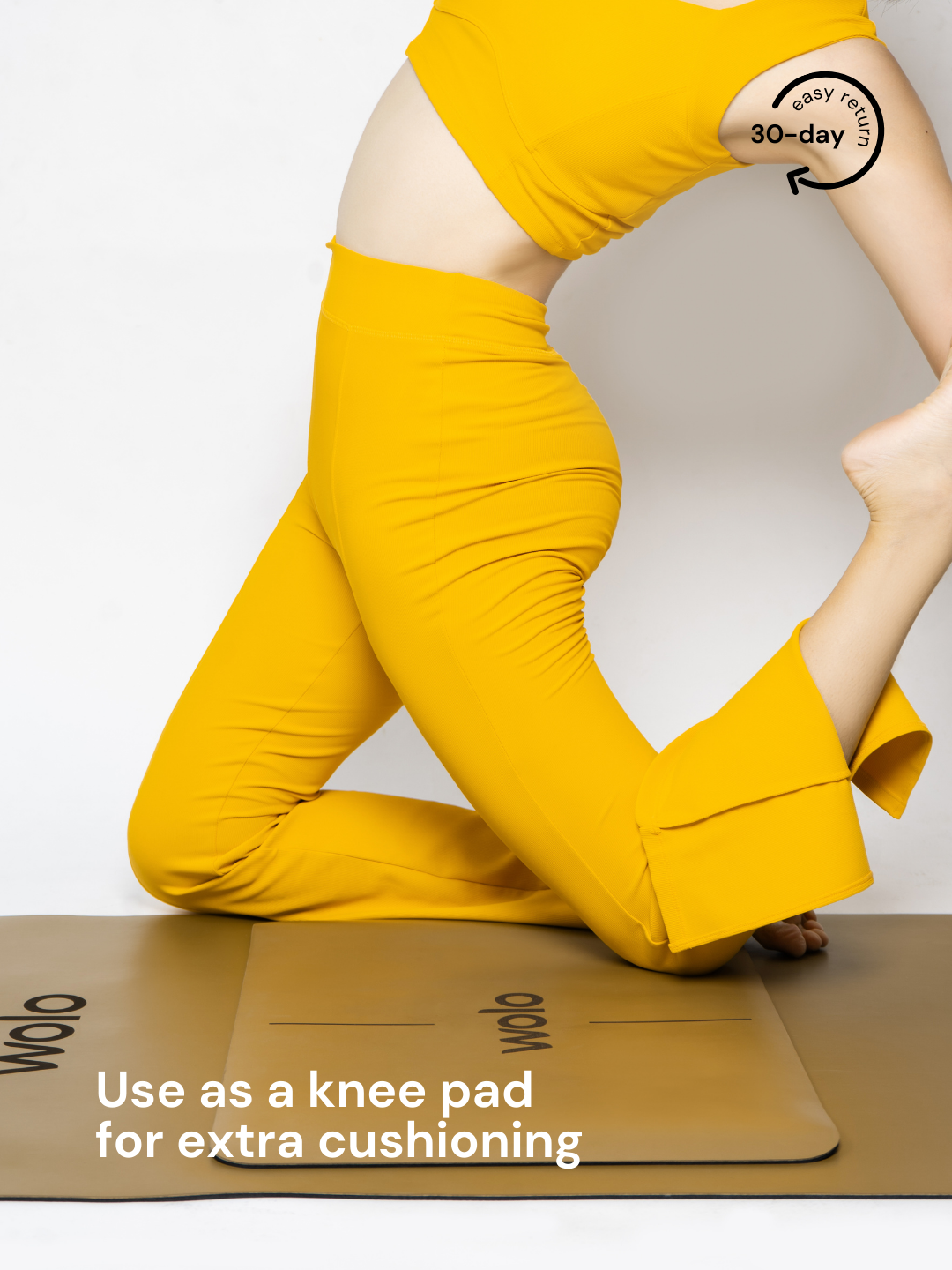 Lady kneeling on a Pebble khaki Align yoga pad