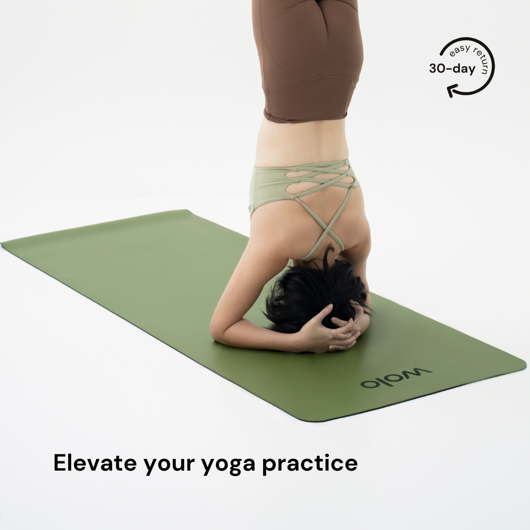 headstand on the sage green yoga mat