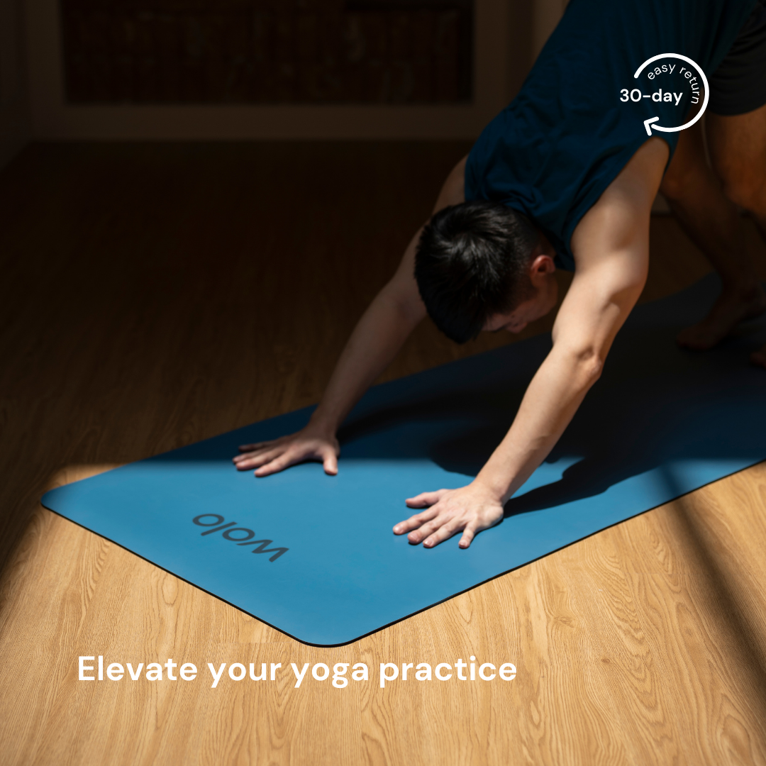 downward facing dog pose on the alaskan blue yoga mat