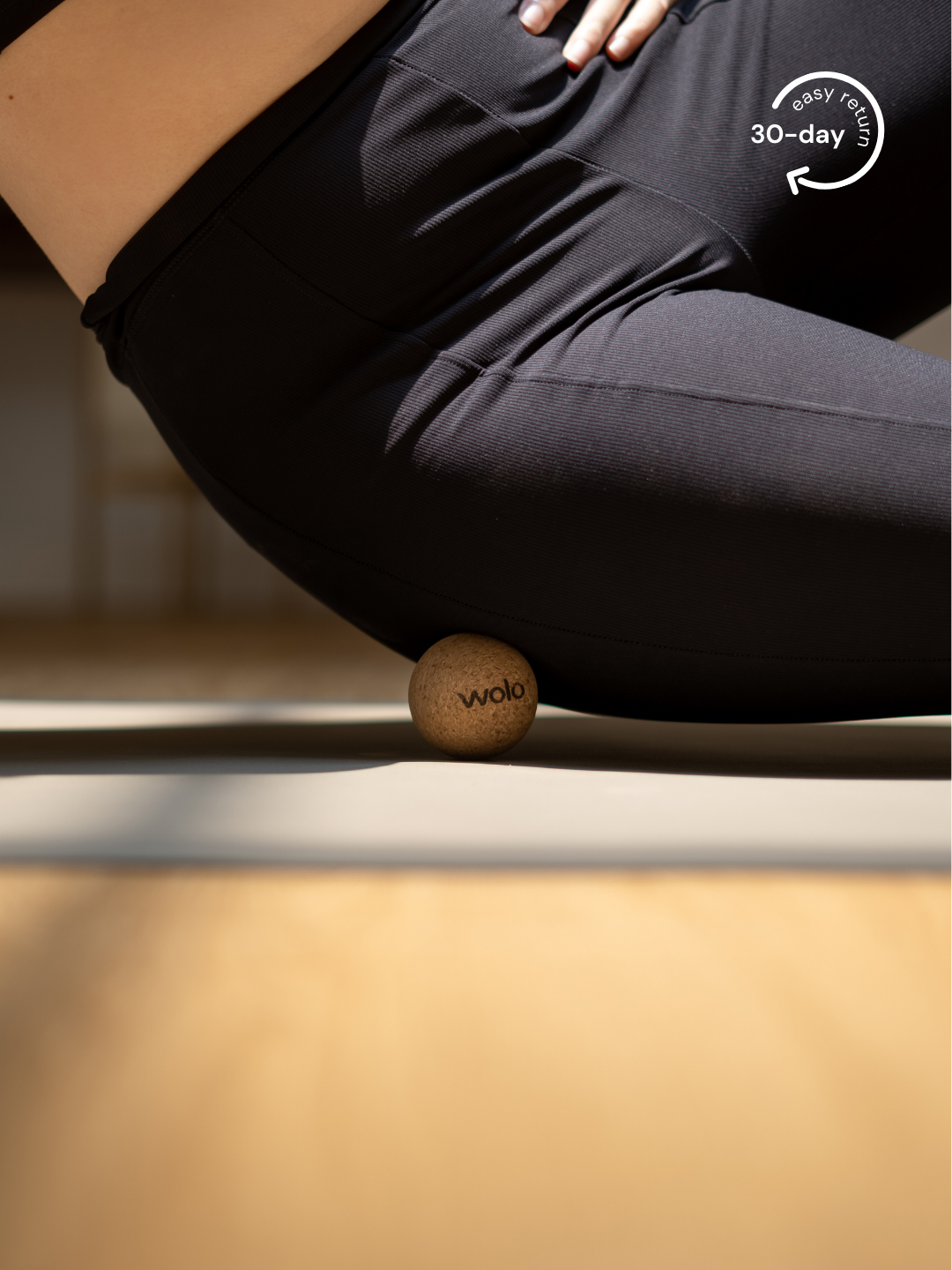 Release hip tension using a cork massage ball