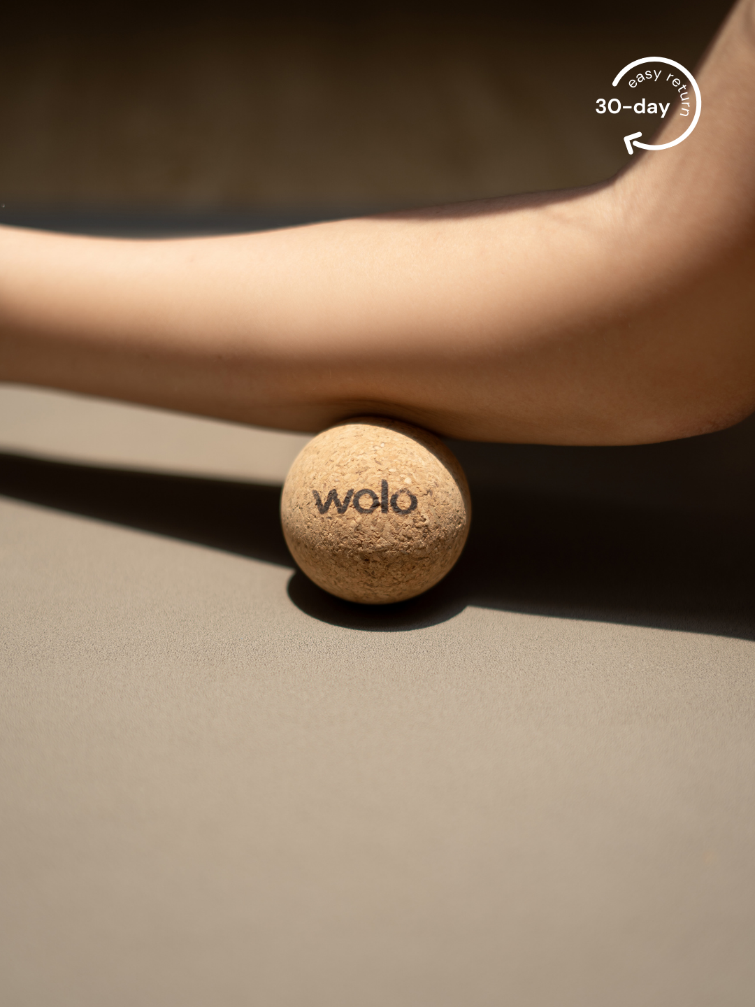 Release arm tension using a cork massage ball