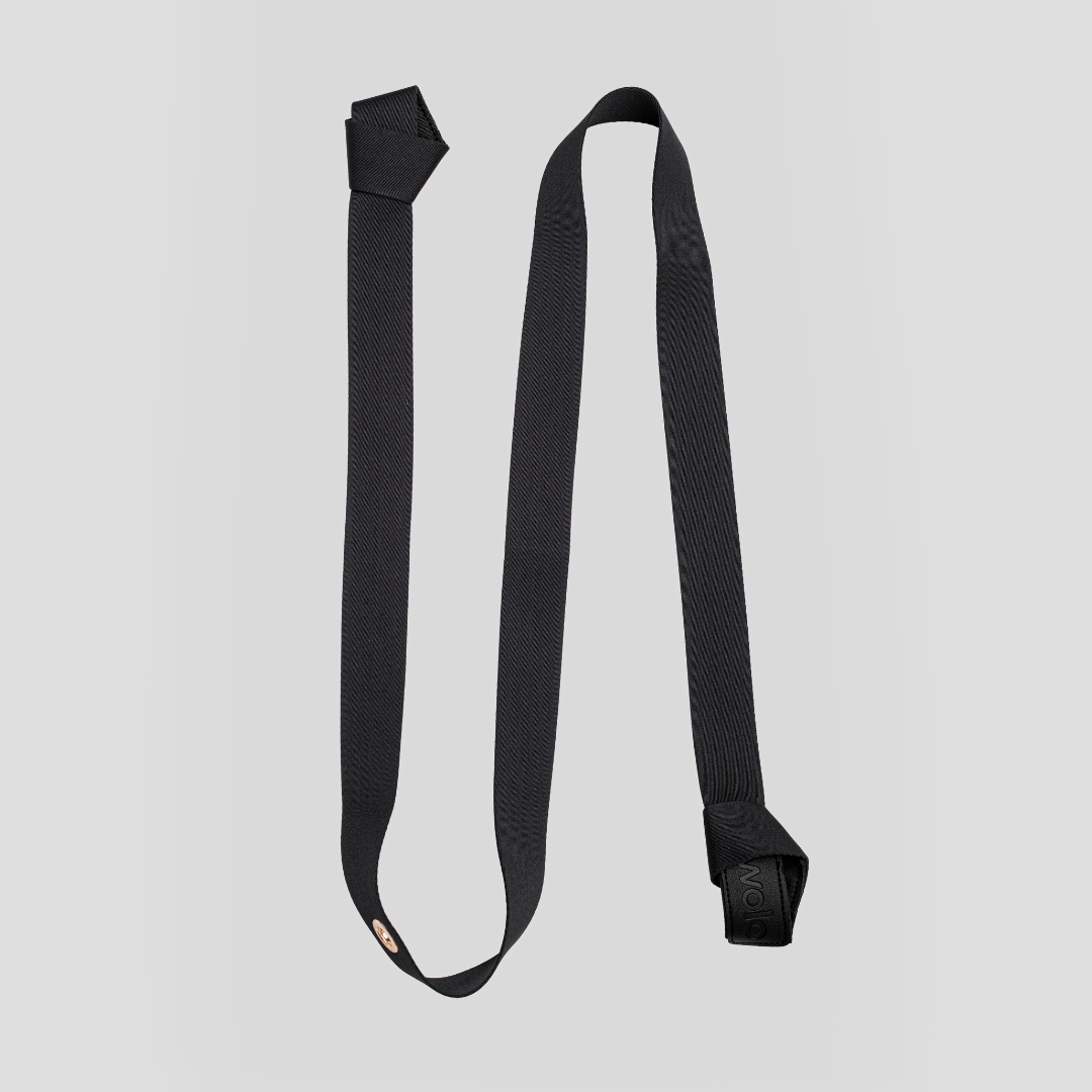 Black yoga strap with a textured pattern on a light gray background #color_ash grey