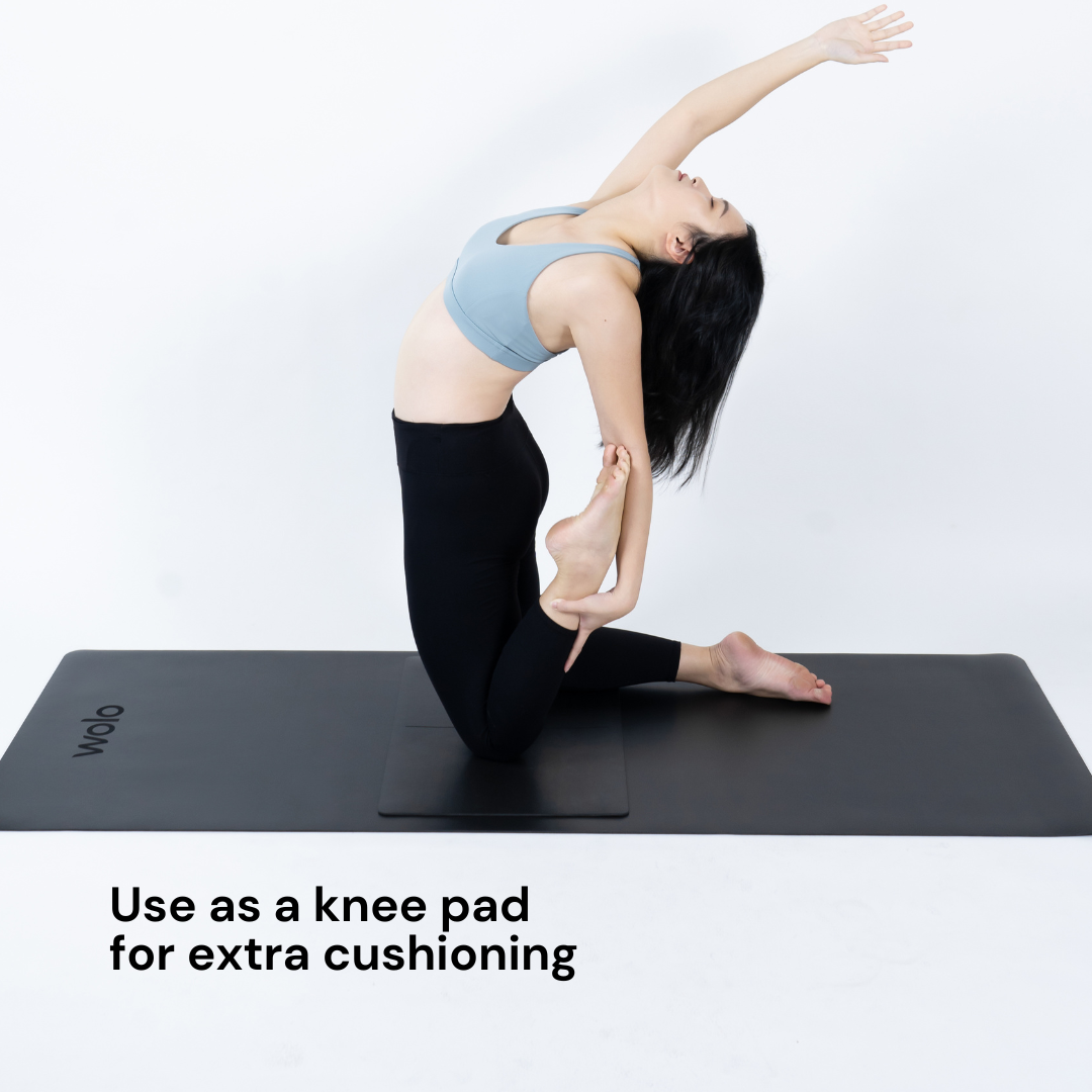 Use black yoga pad for knee support