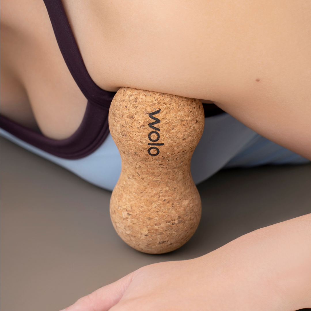Pec release using a cork peanut massage ball