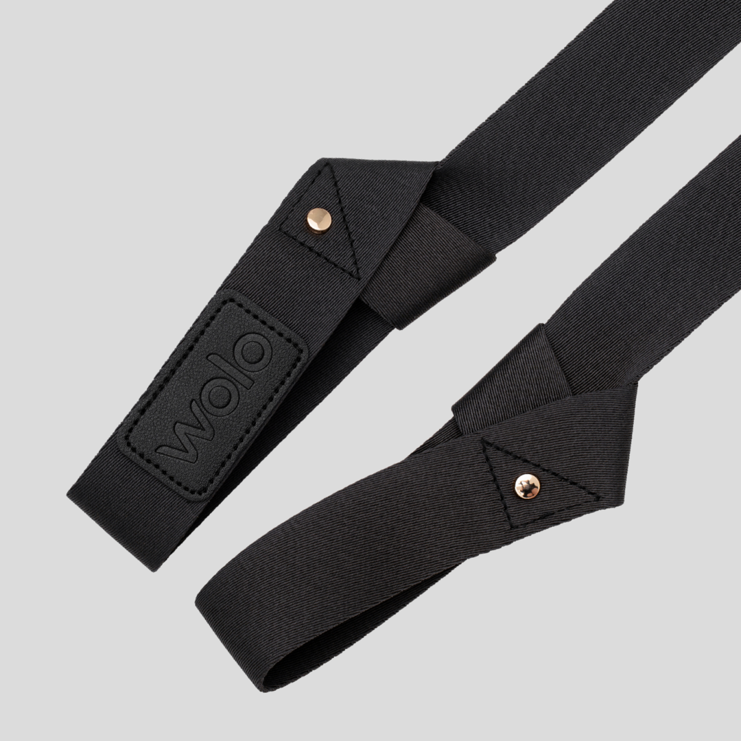 Black yoga strap with gold hardware on a light gray background ash grey yoga mat strap#color_ash grey